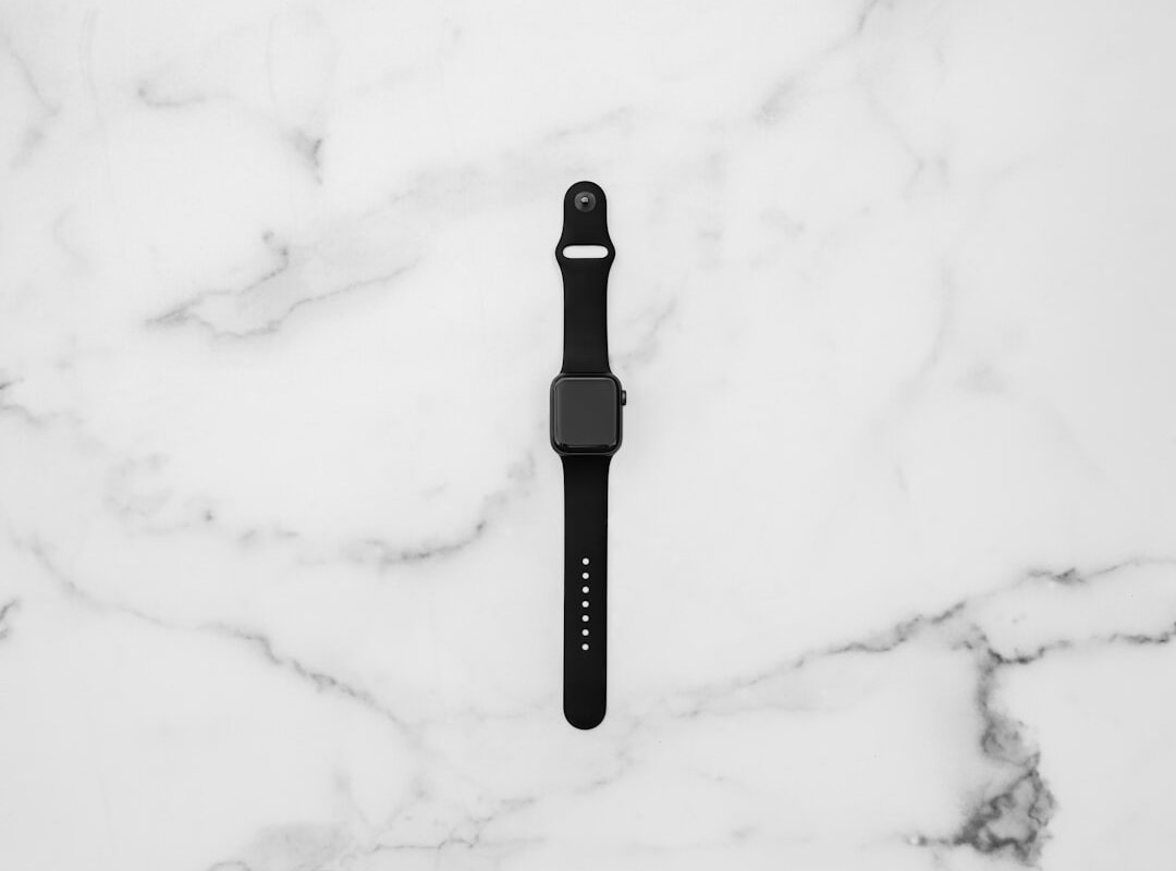 black apple watch on white snow